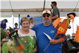 Man and woman holding Halloween decorations