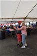Man and woman dancing in the tent