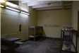 Former jail cell on vacant floor