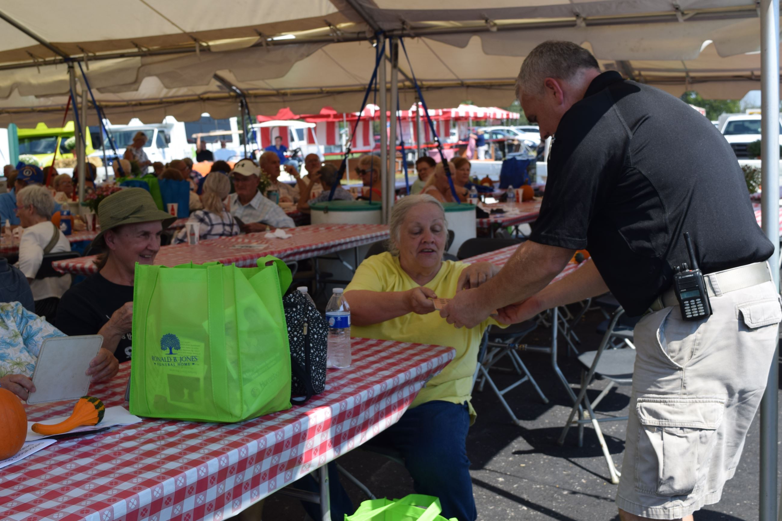 Man and woman discussing Bingo card