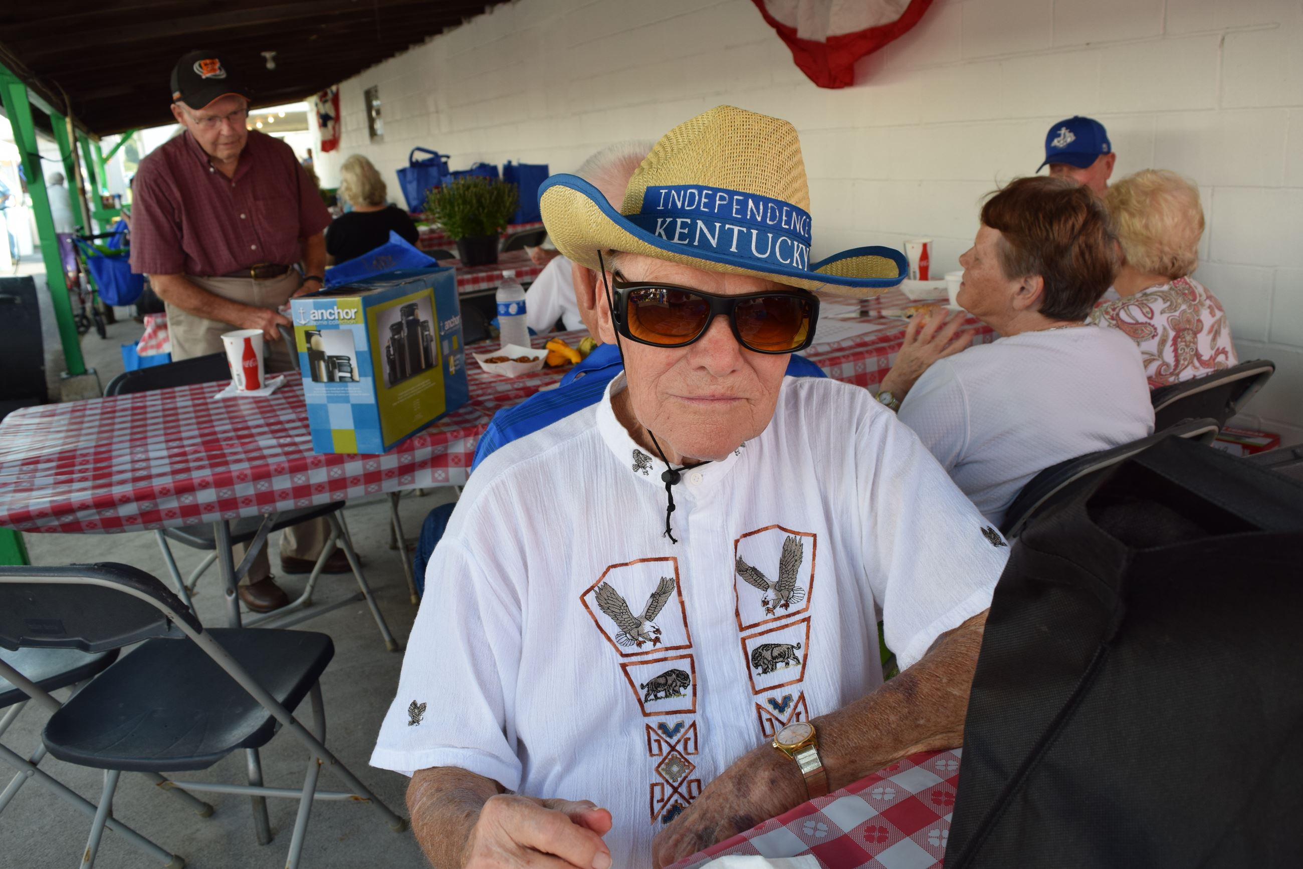 Man wearing hat that says "Independence, Kentucky"