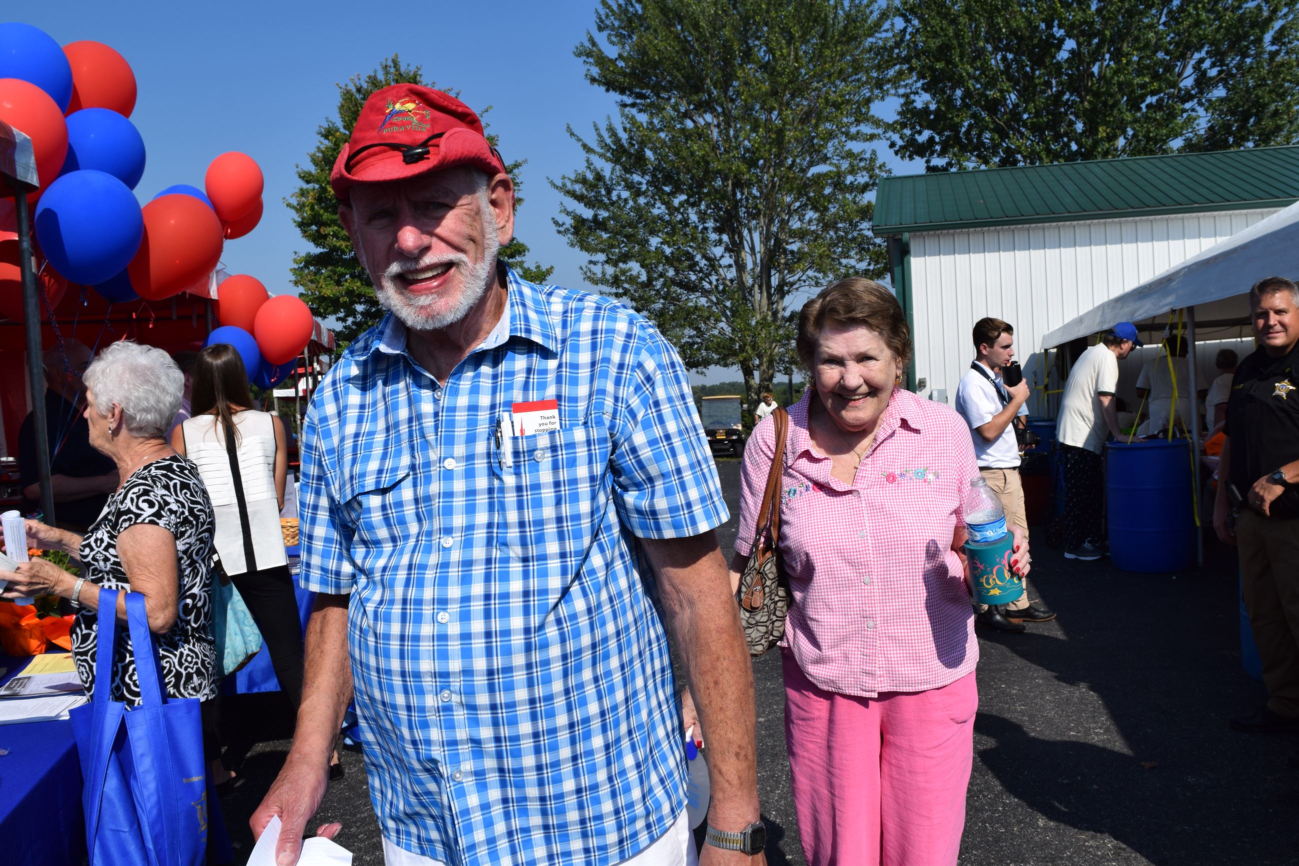 Man and woman smiling and walking together