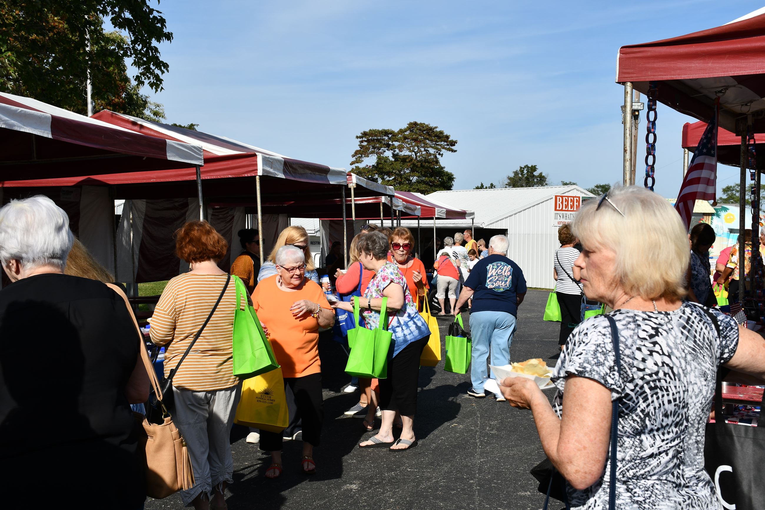 Attendees visit vendor booths.