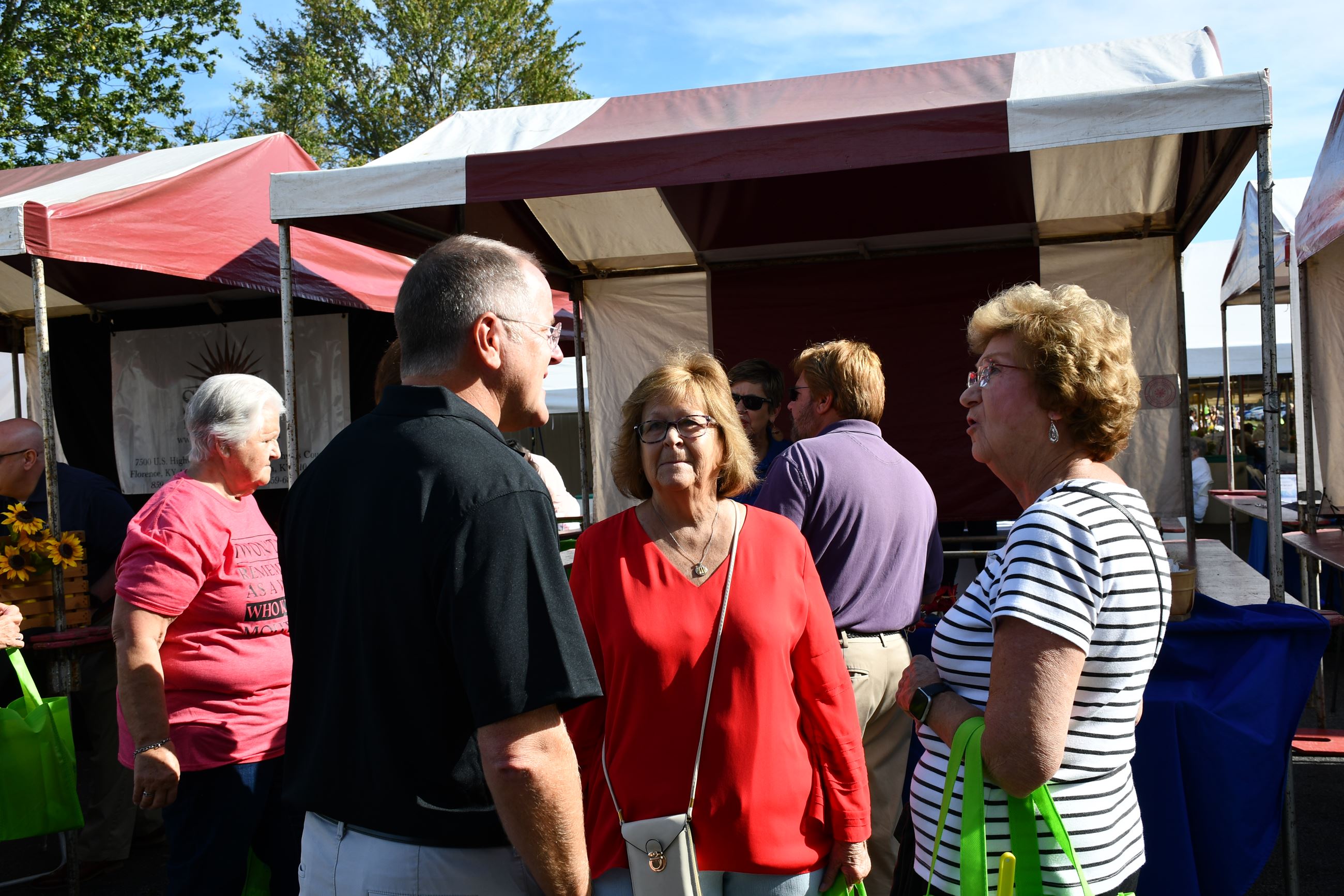 Judge/Executive Kris Knochelmann talks with attendees. 