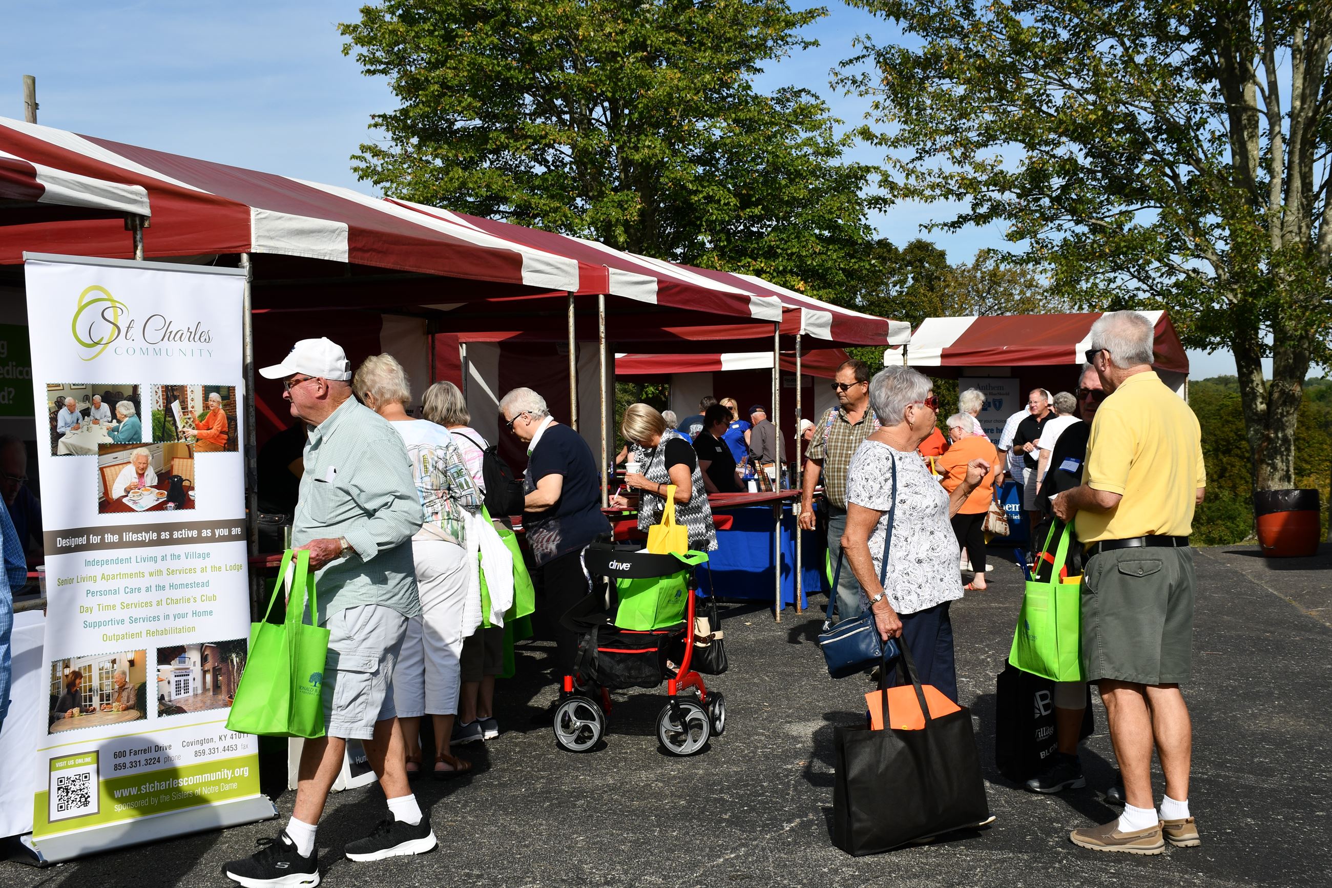 Senior Fall Harvest attendees visit vendors.