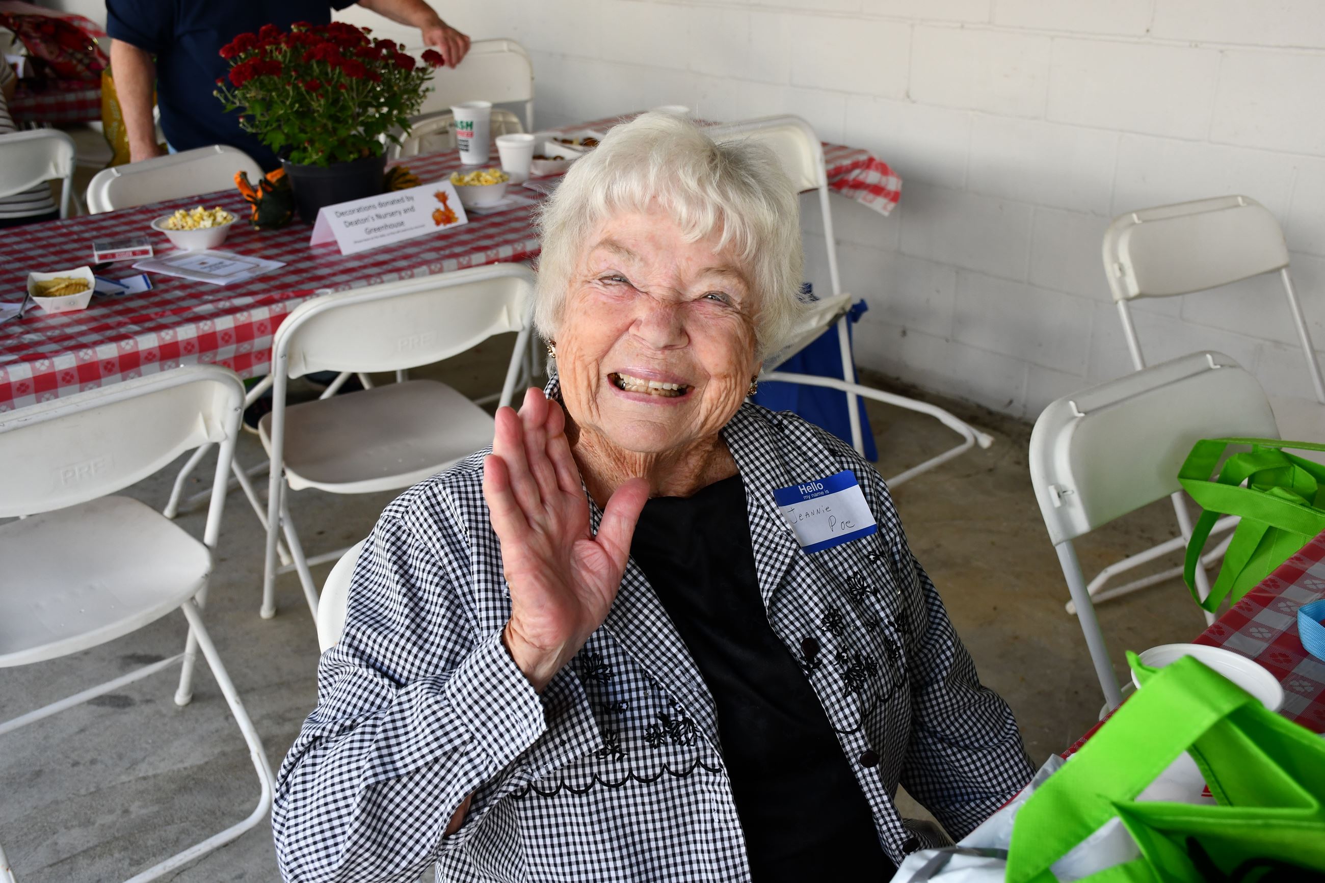 Senior Fall Harvest attendee poses for a photo.