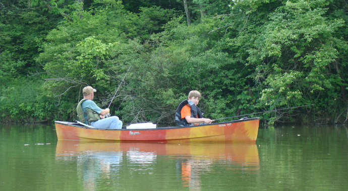 People Fishing in a Boat
