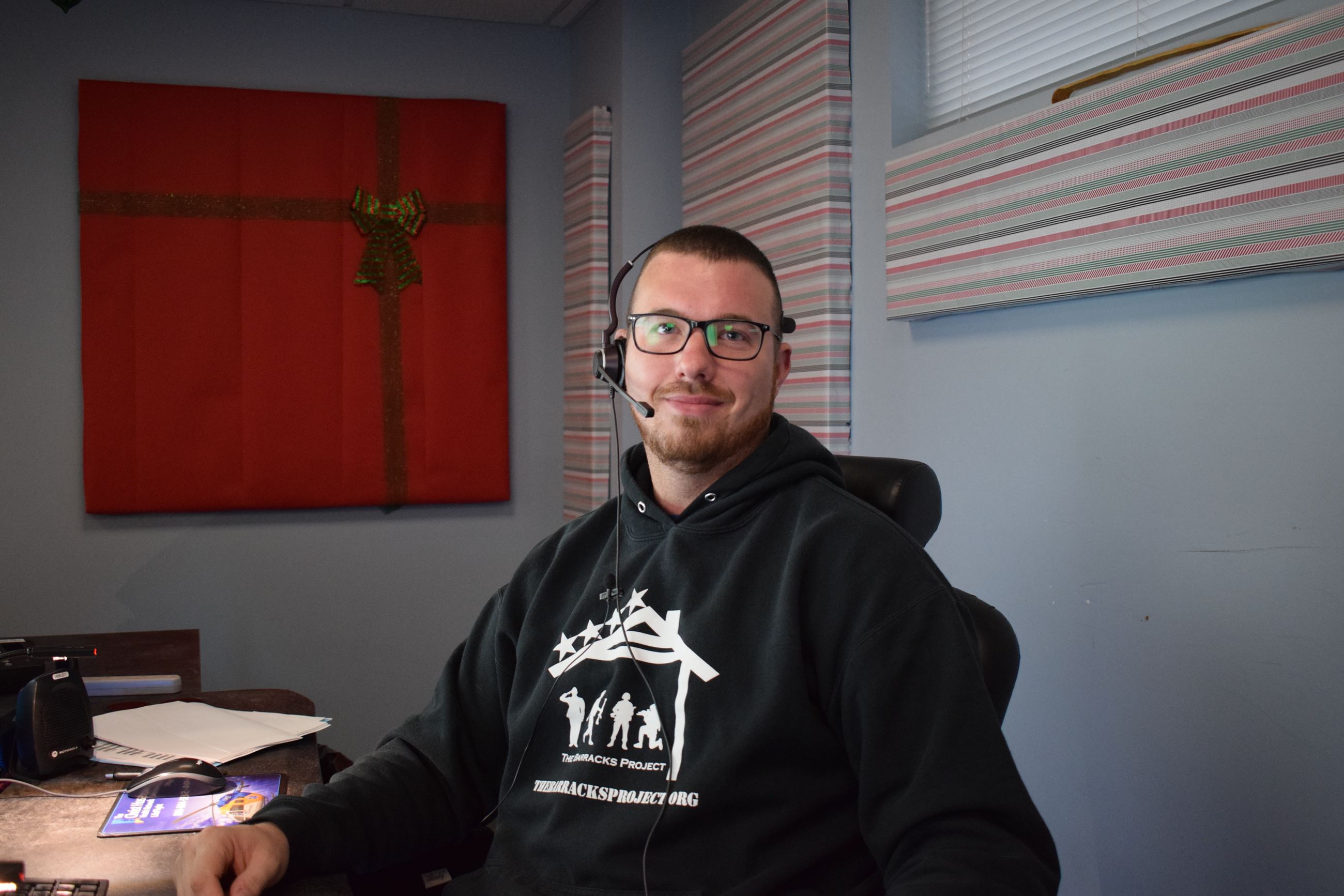 Ian Byrne sitting, smiling